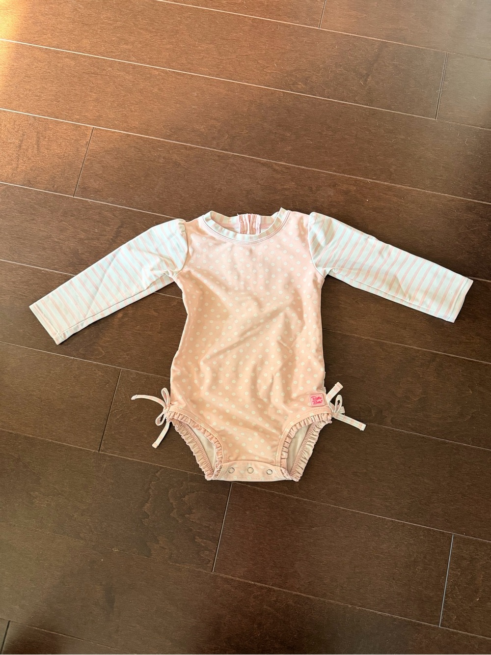 Ruffle Butts Pink Polka Dot Long-Sleeve One-Piece with Striped Sleeves